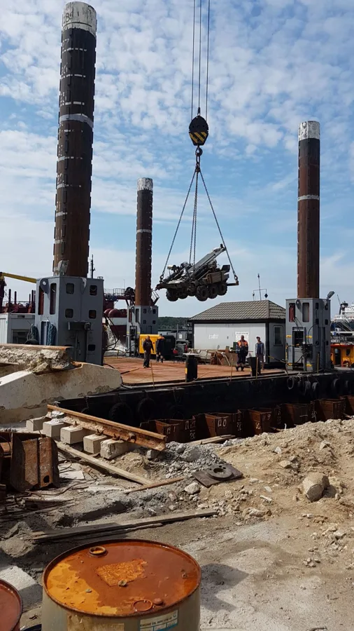 Loading the technique on platform. Preparation for works in Klaipeda port.